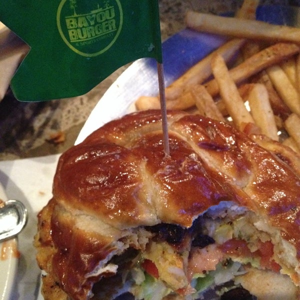 Photo taken at The Bayou Burger &amp; Sports Company by George B. on 1/28/2015