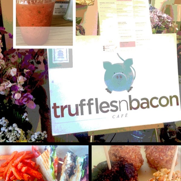 Photo taken at Truffles N Bacon Cafe by Cathy V. on 7/3/2014