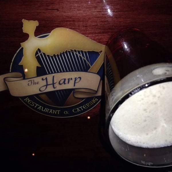 Photo taken at The Harp Restaurant &amp; Catering by Mike K. on 2/7/2014