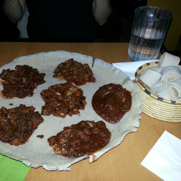 Photo taken at Lalibela Ethiopian Restaurant by T T. on 3/22/2014