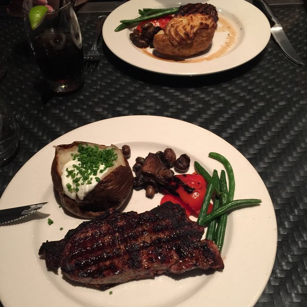 Photo taken at The Keg Steakhouse + Bar - King West by Ester W. on 7/24/2015