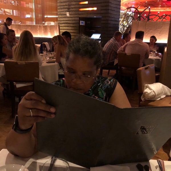 Photo taken at Bobby Flay Steak by Pauline R. on 8/19/2018