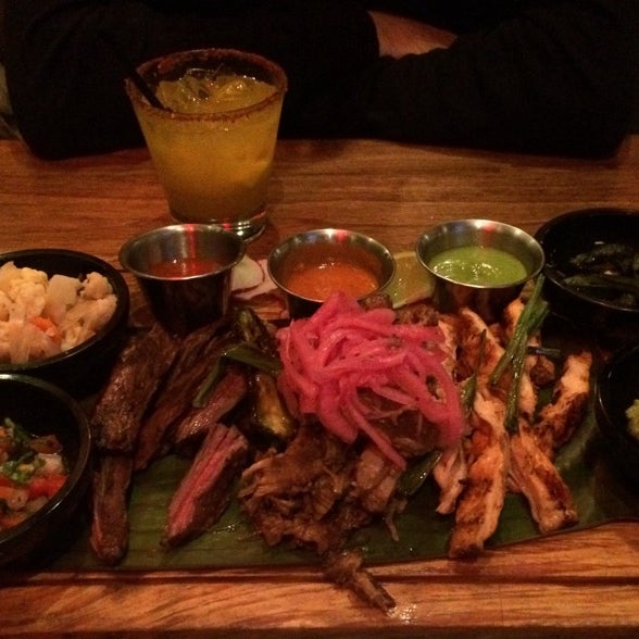 Photo taken at Agaves Kitchen/ Tequila by Cynthia O. on 12/3/2014