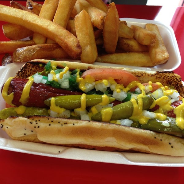 Photo taken at Greatest American Hot Dogs by Jay Z. on 8/10/2013
