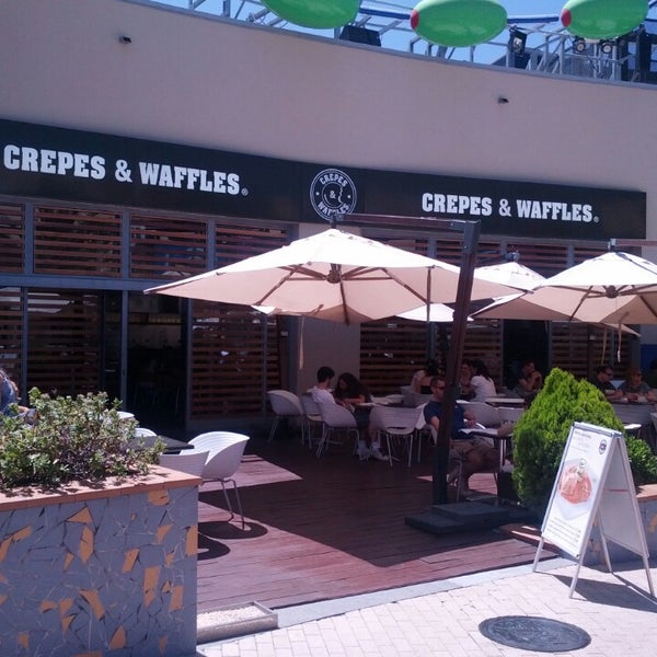 Photo taken at Crepes &amp; Waffles by Sergio B. on 6/29/2013