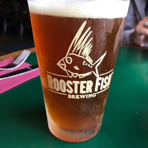 Photo taken at Rooster Fish Brewing Pub by Rob on 6/24/2018