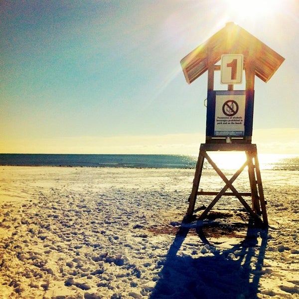 Photo taken at Cobourg Beach by Kevin G. on 1/1/2013