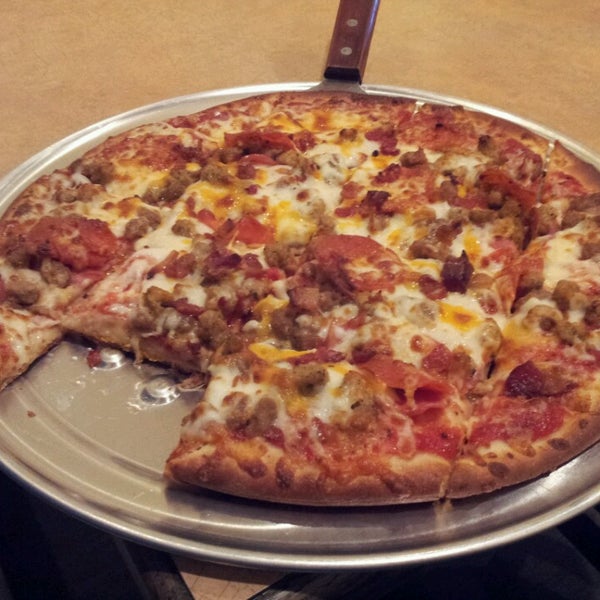 Photo taken at Palio&#39;s Pizza Cafe by Frog on 3/15/2013