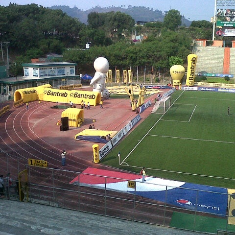 Photo taken at Estadio Cementos Progreso by Jc D. on 5/18/2013