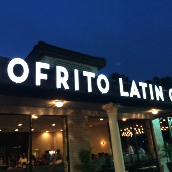 Photo taken at Sofrito Latin Cafe by Julius Droolius on 6/11/2015