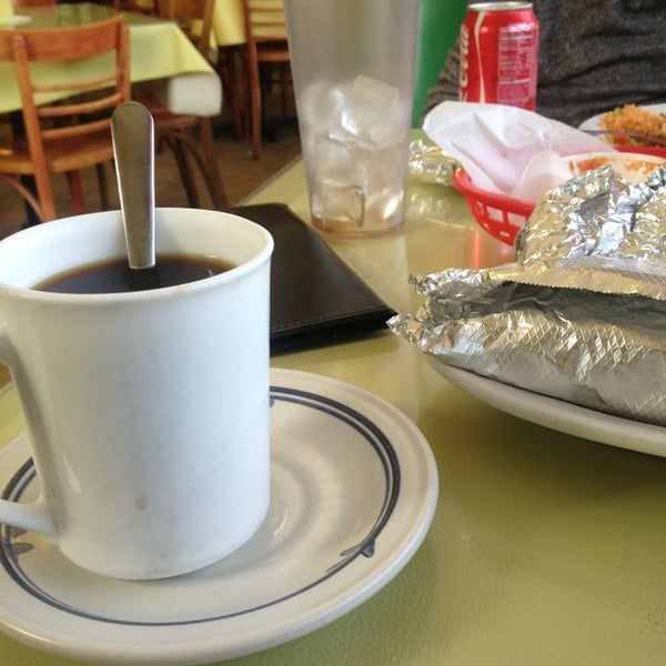 Photo taken at El Milagrito Cafe by Rebecca L. on 3/6/2013