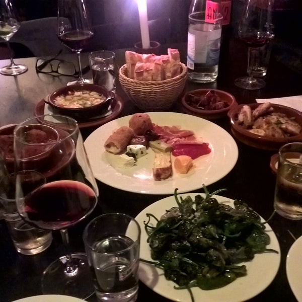 The restaurant is located in a basement, very nice atmosphere, very nice staff. Not to mention a various selection of delicious tapas and tasty wines. It's a must to try it at least once.