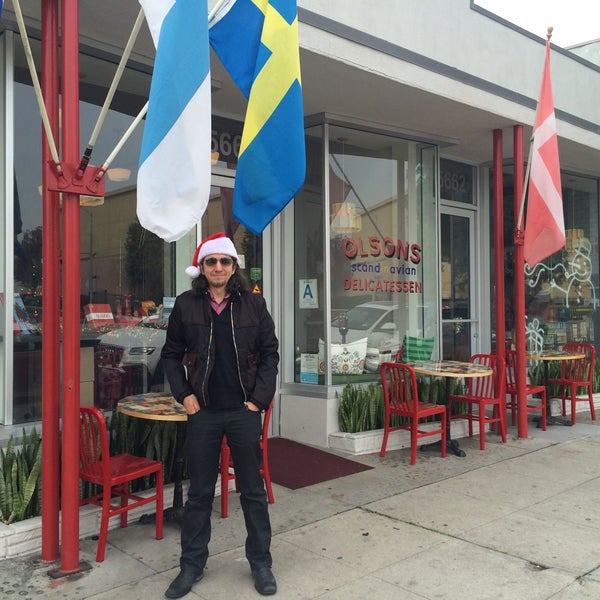 Photo taken at Olsons Scandinavian Delicatessen by Kris V. on 12/21/2014