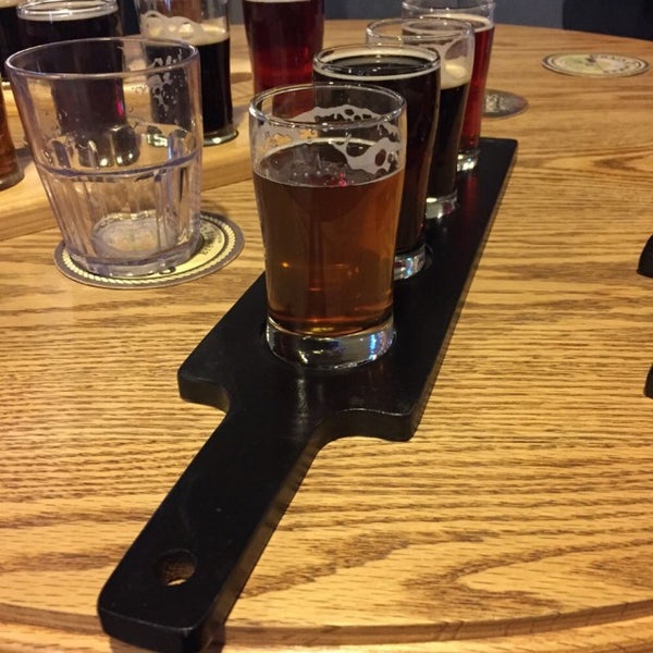 Photo taken at Chain O&#39;Lakes Brewing Company by Erin A. on 4/2/2015