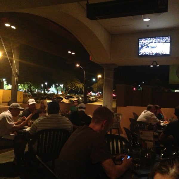 Photo taken at Four Peaks Grill &amp; Tap by Ricky P. on 5/9/2013