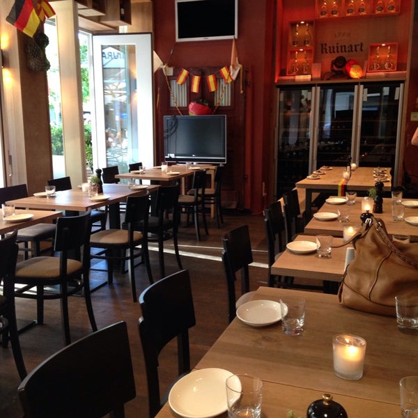 Photo taken at MIURA Tapas-Bar &amp; Restaurant by Sandra J. on 7/3/2014