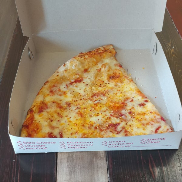 A HUGE slice for right at $3.00. A "Big Chair" institution and a must try for a NY style slice.