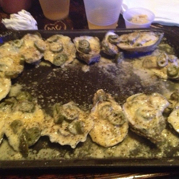 Photo taken at Shuckums Oyster Pub &amp; Grill by Jack K. on 1/24/2014