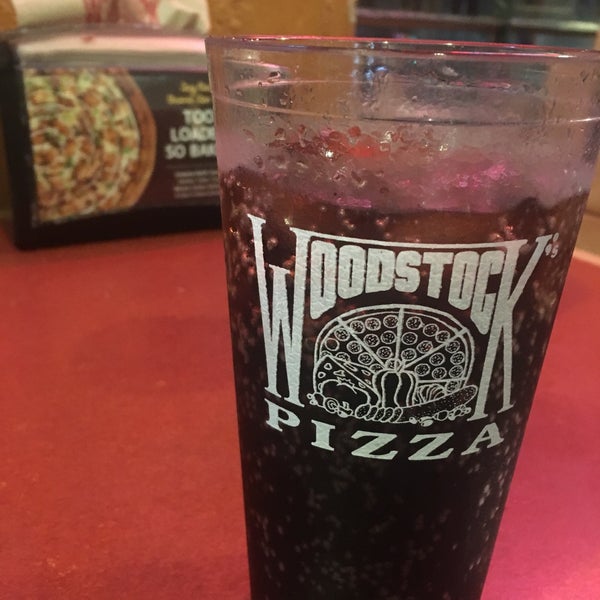 Photo taken at Woodstock&#39;s Pizza by Andreia S. on 10/10/2017