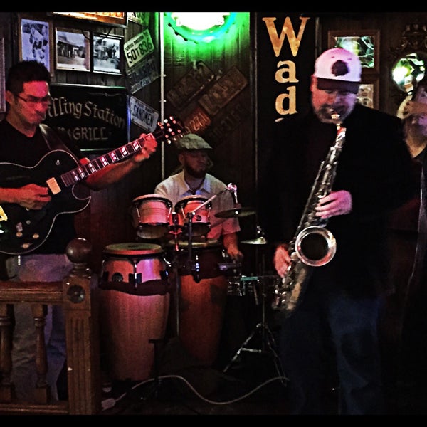 Photo taken at Filling Station Pub &amp; Grill by Alex C. on 9/11/2015