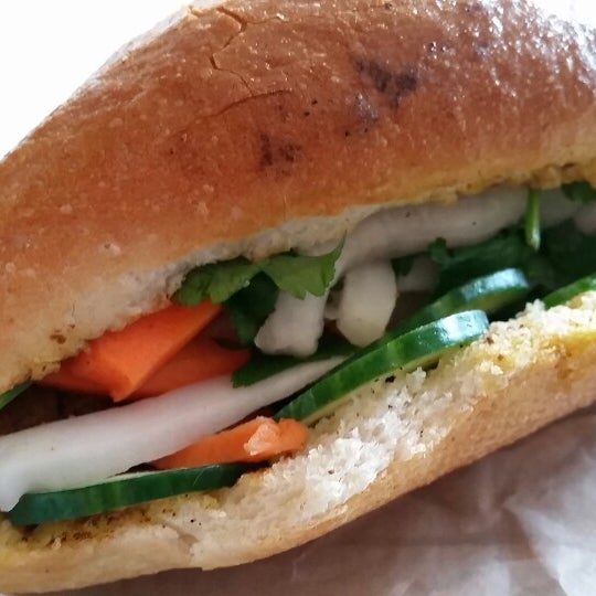 Photo taken at Bánh Mì 11 by Navid S. on 10/25/2014