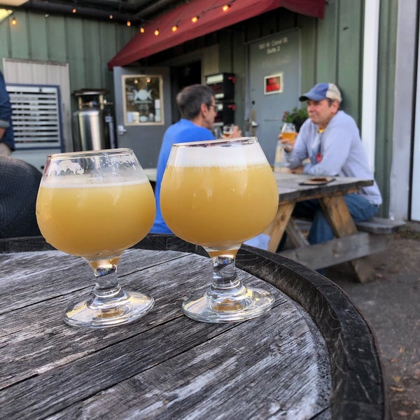 Photo taken at Four Quarters Brewing by Justin H. on 10/12/2019