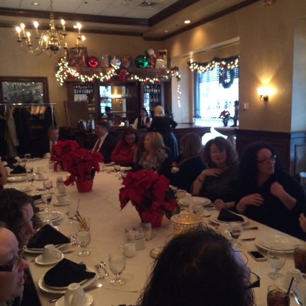 Photo taken at Maggiano&#39;s Little Italy by Edna G. on 12/11/2014