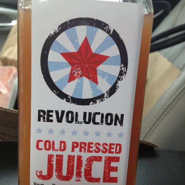 Photo taken at Revolucion Coffee + Juice by Allison H. on 3/27/2013