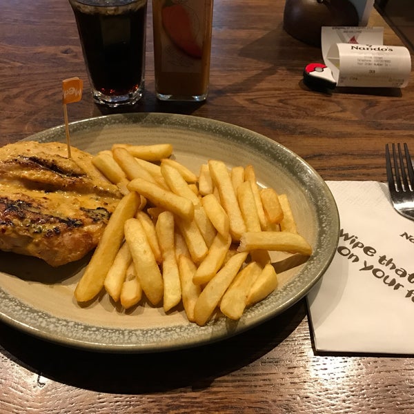 Photo taken at Nando&#39;s by Gilly B. on 11/2/2016