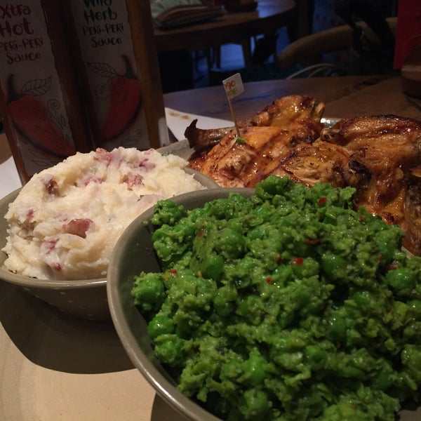 Photo taken at Nando&#39;s by Tanveer A. on 7/8/2015