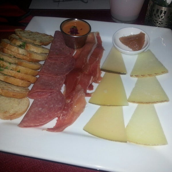 Photo taken at Manchego by Michelle M. on 7/4/2013