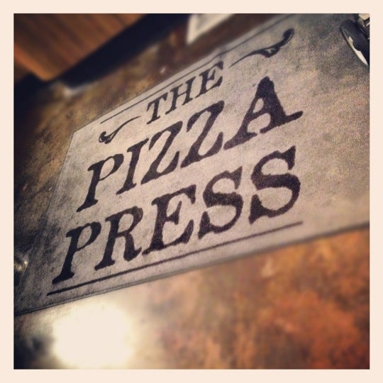 Снимок сделан в The Pizza Press пользователем Nathalie 9/19/2012