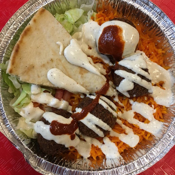 Photo taken at The Halal Guys by Andrew W. on 3/25/2017