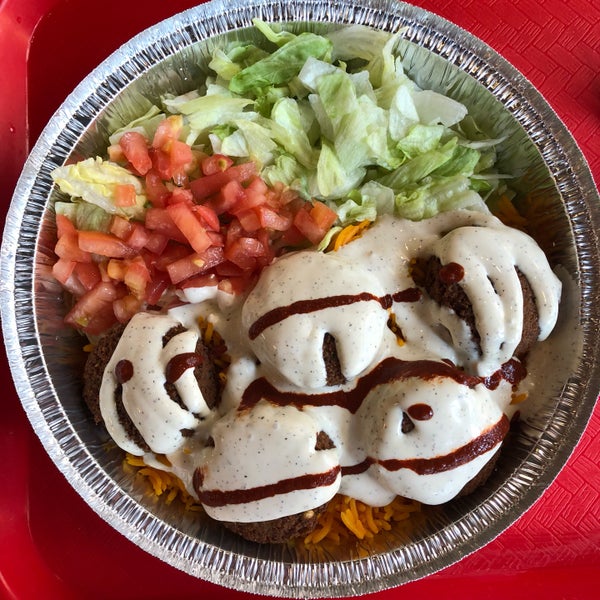 Photo taken at The Halal Guys by Andrew W. on 8/19/2018