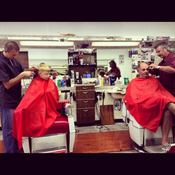 Photo taken at Little Joe &amp; John&#39;s Barber Shop by Sarah G. on 1/16/2013