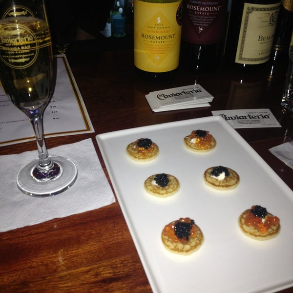 Photo taken at Caviarteria - Beluga Bar - Champagne &amp; Caviar Bar, Restaurant &amp; Lounge by Gay on 3/15/2014