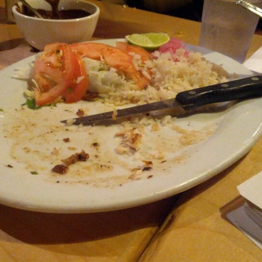 Снимок сделан в Poc-Chuc Restaurant пользователем Holden 12/19/2012