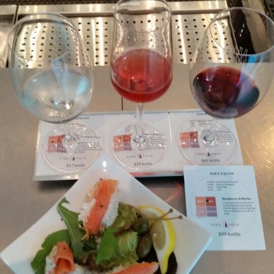Photo taken at Vino Volo Wine Bar by Laura G. on 6/26/2014