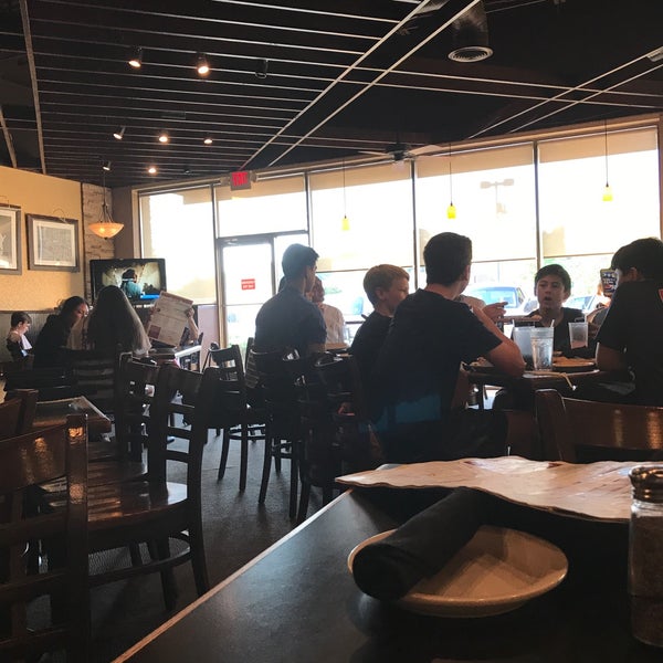 Photo taken at Russo&#39;s New York Pizzeria by Gayle S. on 5/25/2019