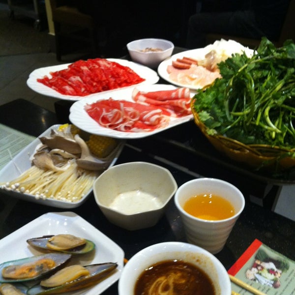 Photo taken at Happy Lamb Hot Pot, Burnaby by Roley C. on 12/26/2012