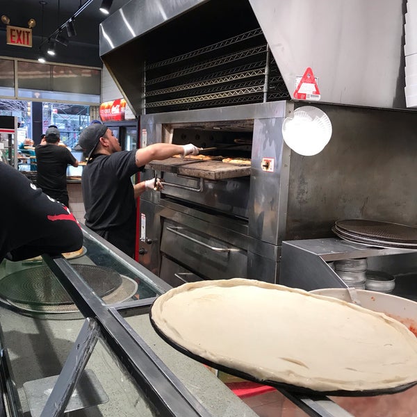 Foto diambil di 2 Bros. Pizza oleh Donia pada 4/18/2019