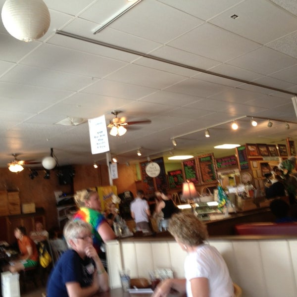 Photo taken at Woodstock Cafe &amp; Shoppes by Kathryn S. on 7/22/2013