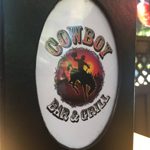Foto diambil di Cowboy Bar &amp; Grill oleh Lil&#39; Benita pada 7/31/2017