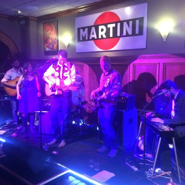 Photo taken at Deja Vu Martini Lounge by Gabriel D. on 8/9/2014