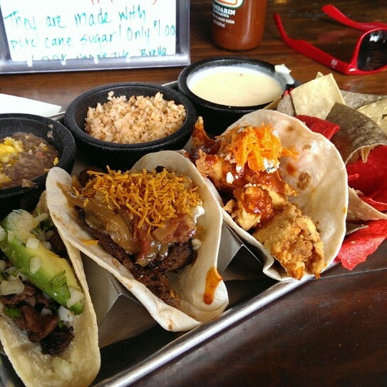 Photo taken at Tacos &amp; Avocados by Luke on 5/23/2014