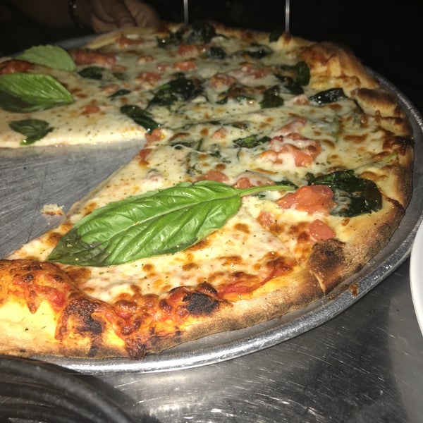 Photo taken at Pizza Rustica by aisha a. on 3/25/2018