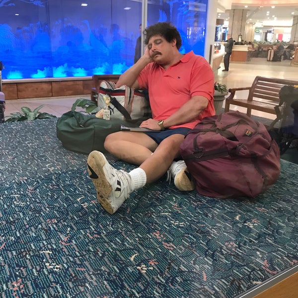The Traveler Statue Orlando International Airport Terminal A The Traveler Statue Orlando International Airport Terminal A