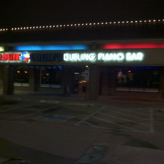 Photo taken at Louie Louie&#39;s Dueling Piano Bar by CHuck B. on 12/20/2012