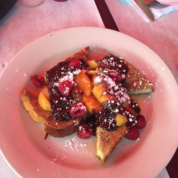 French toast with grilled peaches, raspberries and dark chocolate was delicious. The eggs Benedict were overdone. Cinnamon bun was amaze - we got it for a table of 10 to share before brunch