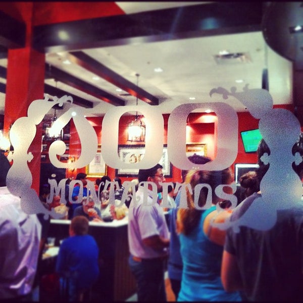 Photo taken at 100 Montaditos by Alex D. on 9/20/2012